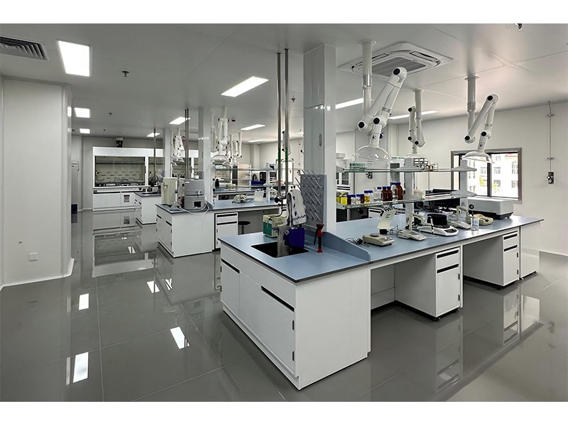 On-site view of adjustable fume extraction arm, ceiling installed universal exhaust hood with clear suction cover in chemistry lab
